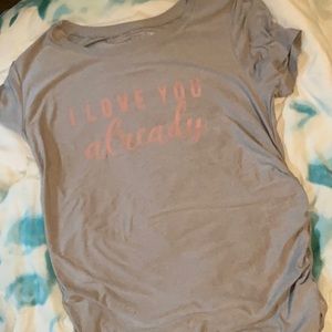 A time and true maternity shirt, it’s a size small. It’s pink & gray!